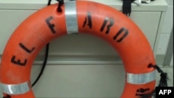 FILE - A life ring was recovered by the Coast Guard from the El Faro cargo ship, which sank Oct. 1. Salvage operations were suspended Monday. 