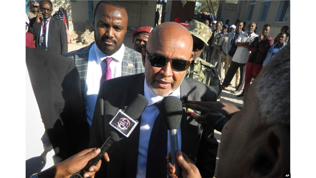 FILE - Opposition candidate Abdirahman Mohamed Abdullahi speaks to the media after casting his vote in the presidential election in Hargeisa, in the semi-autonomous region of Somaliland, in Somalia, Nov. 13, 2017.