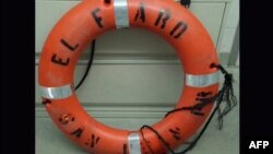 This still image from video taken by the US Coast Guard shows a life ring recovered by the Coast Guard from the El Faro cargo ship, that has gone missing during Hurricane Joaquin. Rescuers were still frantically searching for the El Faro cargo vessel, with which contact was lost early October 1 as the dangerous weather system approached the Bahamas, Oct. 4, 2015.