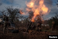 Ukrainian servicemen fire a mortar on a front line, as Russia's attack on Ukraine continues, near Bakhmut, Donetsk region, Ukraine, in this handout image released Nov. 6, 2022. (Iryna Rybakova/Press Service of the 93rd Independent Kholodnyi Yar Mechanized Brigade of the Ukrainian Armed Forces/Handout via Reuters)