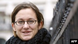 FILE - French journalist Sonia Rolley poses in Paris on March 26, 2008. She was expelled from DRC on Tuesday after her application for journalistic accreditation was not approved.