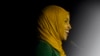 U.S. Representative Ilhan Omar speaks to a crowd early morning Wednesday in St. Paul, Minnesota, after winning re-election to represent Minnesota’s 5th district. She is the most prominent of several Somali-American candidates to win on election night.