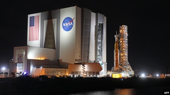 The Artemis-1 rocket is rolled out from the Vehicle Assembly Building at the Kennedy Space Center in Florida on Nov. 3, 2022. 