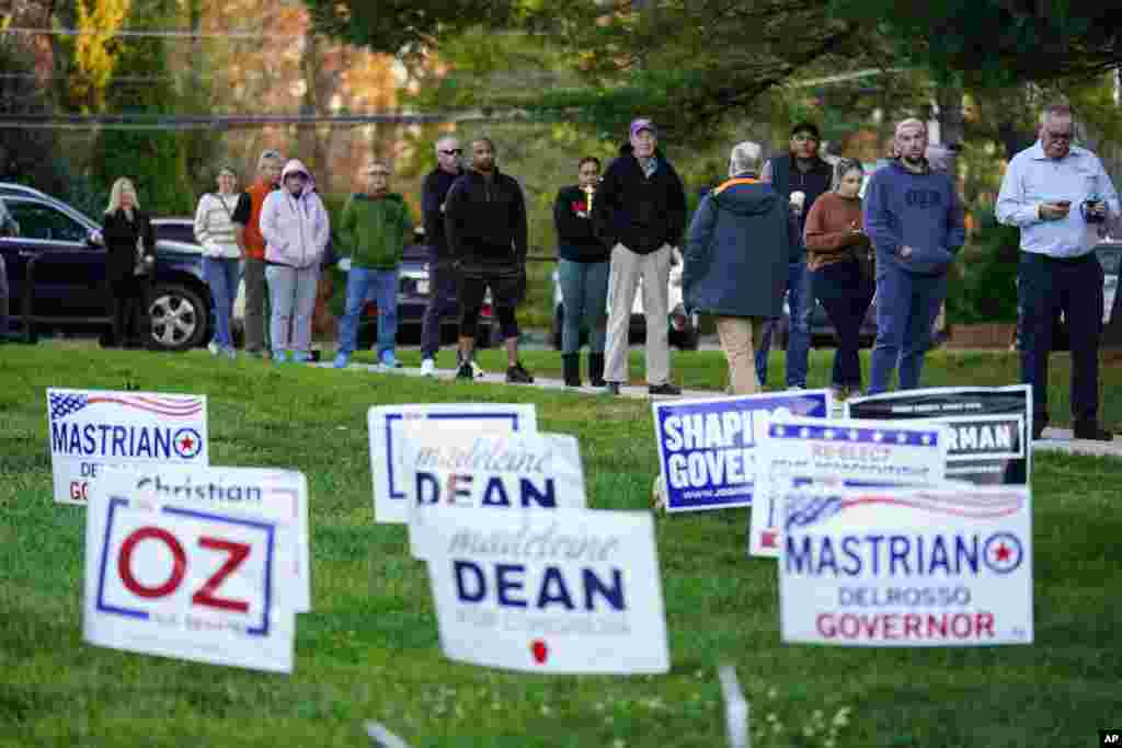 Voters wait in line to cast their ballots in the midterm election in Rydal, Pennsylvania, Nov. 8, 2022.