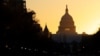 The sun rises over the U.S. Capitol in Washington, U.S., November 9, 2022. REUTERS.