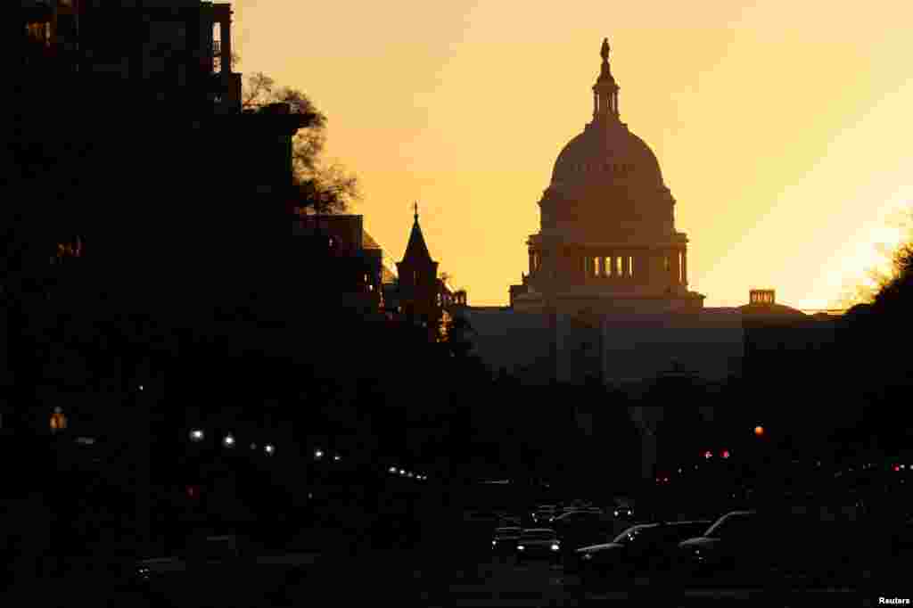 The sun rises over the U.S. Capitol in Washington, U.S., November 9, 2022.