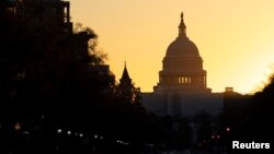 The sun rises over the U.S. Capitol in Washington, U.S., November 9, 2022. REUTERS.