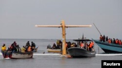 FILE: Rescuers attempt to recover the Precision Air passenger plane that crashed into Lake Victoria in Bukoba, Tanzania. Taken November 6, 2022. 