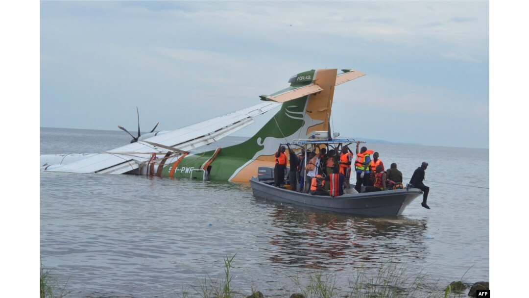 FILE - Rescuers search for survivors after a Precision Air flight that was carrying 43 people plunged into Lake Victoria as it attempted to land in the lakeside town of Bukoba, Tanzania, Nov. 6, 2022.