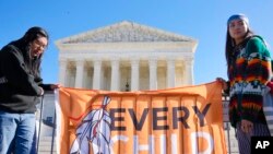 The Supreme Court is wrestling with a challenge to a federal law that gives preference to Native American families in foster care and adoption proceedings of Native children. 