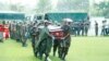Soldiers carry the casket of a victim, after a passenger plane plunged into Lake Victoria, at the Kaitaba Stadium in Bukoba, Tanzania, Nov 7, 2022.