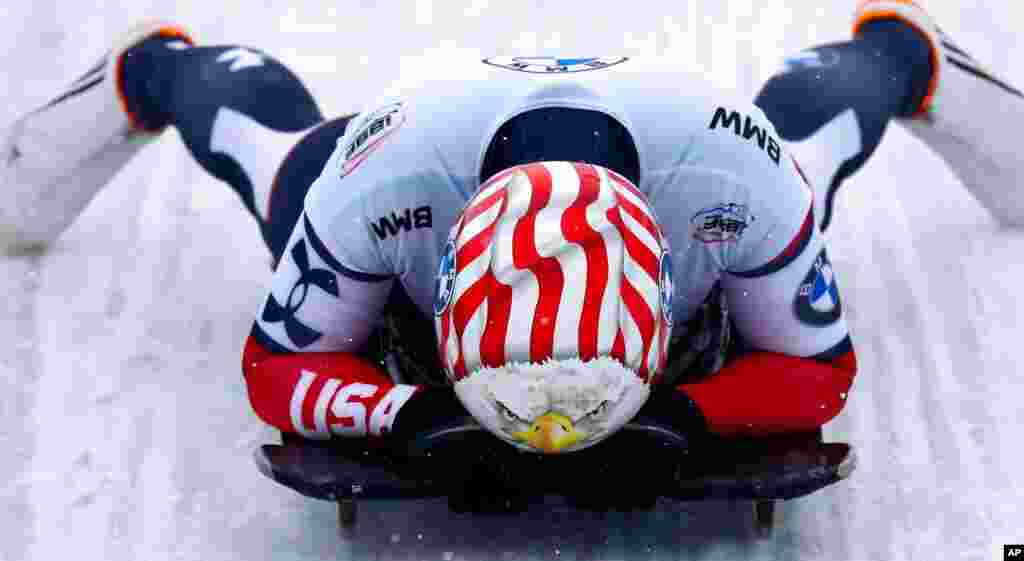 Katie Uhlaender of the United States reacts at the end of her run during the women&#39;s skeleton race at the Bobsleigh and Skeleton World Championships in Altenberg, Germany.