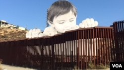 La descomunal imagen obra del artista francés #Jr que alcanza casi 20 metros de alto estará siendo exhibida hasta el 7 de octubre. [Fotos cortesía de Luis Germán Gómez García-Herreros].