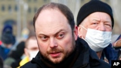 FILE - Vladimir Kara-Murza, Russian opposition activist, arrives to lay flowers near the place where Russian opposition leader Boris Nemtsov was gunned down, in Moscow, Russia, on Feb. 27, 2021.