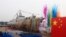 Upacara peluncuran kapal perusak rudal terbaru Angkatan Laut China Tipe 055 buatan dalam negeri, di Galangan Kapal Jiangnan, Shanghai, 28 Juni 2019.(Wang Donghai/Xinhua via AP, File)