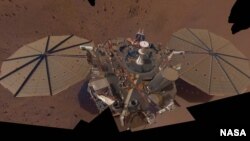 This "selfie" photo of NASA’s InSight lander is made up of 14 images taken on March 15 and April 11, 2021 – the 106th and 133rd Martian days, or sols, of the mission – by the spacecraft Instrument Deployment Camera located on its robotic arm. (Image Credits: NASA/JPL-Caltech)