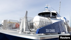 Sea Change ferry is seen docked at Squalicum Harbor in Bellingham, Washington, U.S., April 7, 2022. The 75-passenger ferry, propelled entirely by hydrogen fuel cells, was built by All American Marine and conceived of by Switch Maritime. (REUTERS/Matt Mills McKnight)