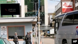 Rescuers go to join the search for 10 miners gone missing after a powerful underground tremor and methane gas discharge at the Borynia-Zofiowka coal mine in Jastrzebie-Zdroj, southern Poland, April 23, 2022.