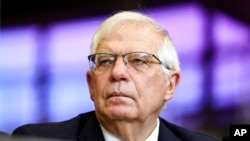 FILE: European Union foreign policy chief Josep Borrell on March 30, 2022. The European Union is warning consumers to stop using their clothing like throwaway tissues and is planning measures to counter the spiraling use of polluting "fast fashion." 