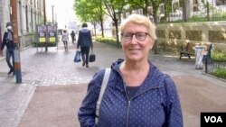 Pantin voter Benedicte Tardivo supports Macron's foreign policy but thinks he can do better domestically if he is reelected. (Lisa Bryant/VOA)