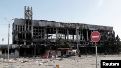 FILE - A view shows a railway station destroyed during the Ukraine-Russia conflict in the southern port city of Mariupol, Ukraine, April 26, 2022.