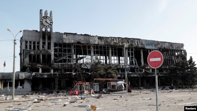 FILE - A view shows a railway station destroyed during the Ukraine-Russia conflict in the southern port city of Mariupol, Ukraine, April 26, 2022.