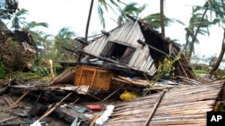 FILE - A house lays in ruins after Cyclone Batsirai in Mananjary, Madagascar, Feb. 10, 2022. 