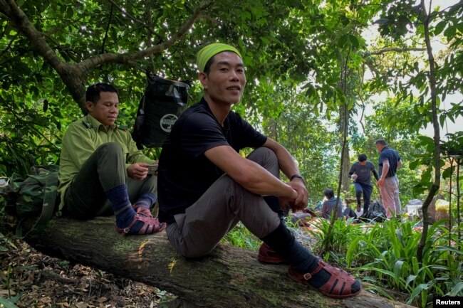 Nguyen Ngoc Anh, 36, who was an illegal logger turned forest protector poses at Phong Nha National Park, Quang Binh province, April 8, 2022. (REUTERS/Hoang Trung)