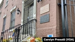 Supporters continue to leave flowers outside the Ukrainian embassy in Georgetown, a tony neighborhood in Washington, D.C. Many feature the sunflower, the National flower of Ukraine, now a symbol of peace.