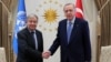 Turkish President Recep Tayyip Erdogan shakes hands with United Nations Secretary-General Antonio Guterres as they meet in Ankara, Turkey, April 25, 2022. (Presidential Press Office/Handout via Reuters)