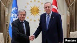 Turkish President Recep Tayyip Erdogan shakes hands with United Nations Secretary-General Antonio Guterres as they meet in Ankara, Turkey, April 25, 2022. (Presidential Press Office/Handout via Reuters)