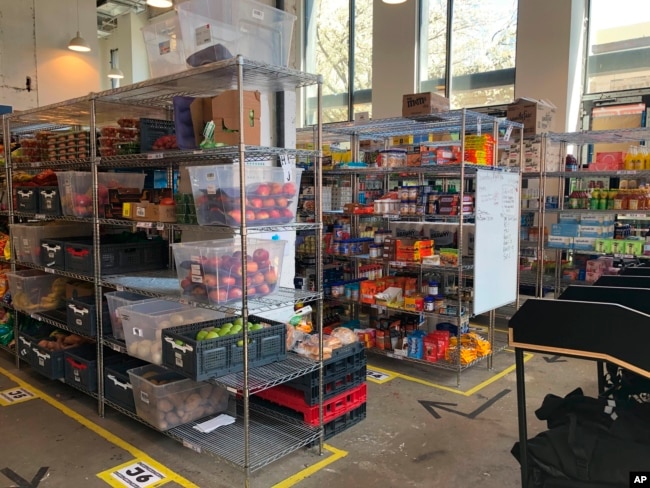 Merchandise is stocked inside Gorillas mini-warehouse in the Williamsburg section of the Brooklyn borough of New York on Monday, April 12, 2022. (AP Photo/Tali Arbel)