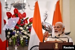 Indian Prime Minister Narendra Modi speaks at the Hyderabad House in New Delhi, India, April 22, 2022.