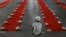 A Muslim boy waits to break his day-long fast during Ramadan in Hyderabad, India, April 27, 2022.