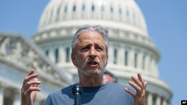 FILE - Jon Stewart speaks in support of legislation to expand benefits for veterans suffering from toxic exposure to burn pits and other hazards, Washington, May 26, 2021.