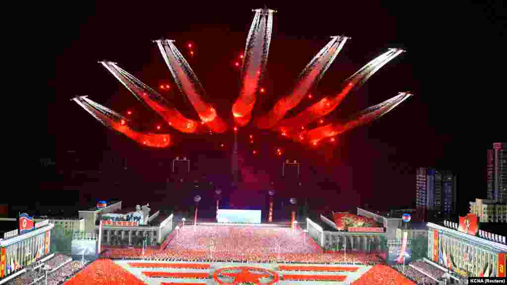 Planes perform an aerial display during a nighttime military parade to mark the 90th anniversary of the founding of the Korean People&#39;s Revolutionary Army&nbsp;in Pyongyang, North Korea, in this undated photo released by North Korea&#39;s Korean Central News Agency.