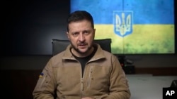 FILE - In this image from video provided by the Ukrainian Presidential Press Office, Ukrainian President Volodymyr Zelenskyy speaks from Kyiv, Ukraine, April 22, 2022.