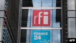 RFI and France 24 logos are seen in this April 9, 2019 file photo.