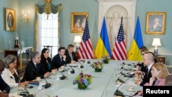 Ukrainian Prime Minister Denys Shmyhal, center right, and U.S. Secretary of State Antony Blinken, second from left, attend a meeting at State Department, amid Russia's invasion of Ukraine, in Washington, April 22, 2022.