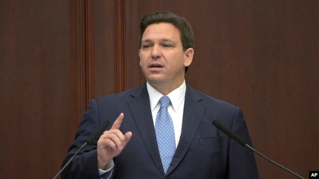 FILE - Florida Gov. Ron DeSantis addresses a joint session of a legislative session, Jan. 11, 2022, in Tallahassee, Fla.
