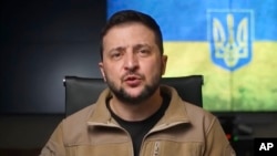 In this image from video provided by the Ukrainian Presidential Press Office, Ukrainian President Volodymyr Zelenskyy speaks from Kyiv, Ukraine, April 22, 2022.