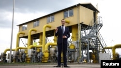 Poland's Prime Minister Mateusz Morawiecki speaks during a news conference near the gas installation at a Gaz-System gas compressor station in Rembelszczyzna, outside Warsaw, Poland, April 27, 2022.