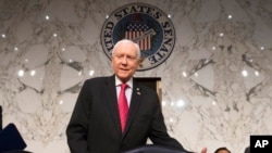 FILE - Senate Finance Committee Chairman Orrin Hatch, R-Utah, arrives to work on overhauling the nation's tax code, on Capitol Hill in Washington. 
