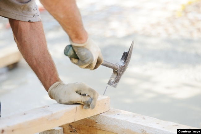 Hitting the nail directly on the nail head ensures the nail will go into the wood straight.