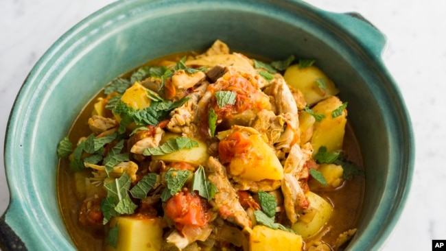 This image released by Milk Street shows a recipe for Cape Malay Chicken Curry. (Milk Street via AP)