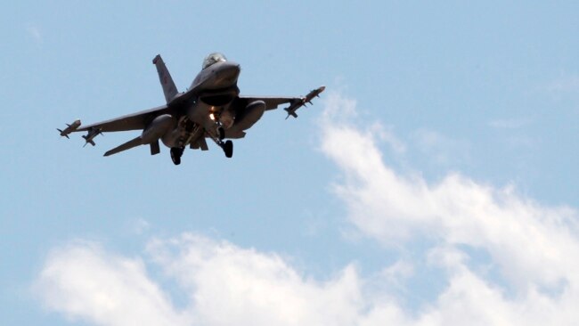 FILE - A Turkish F-16 fighter jet approaches Incirlik Air Base in Adana, Turkey, July 3, 2012.