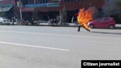 This citizen journalist image shows a Tibetan man self-immolating in Labrang, China, October 23, 2012.