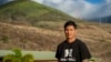 TJ Rickard, Lahainaluna High School boys basketball coach, poses for a portrait at Lahainaluna High School in Lahaina on the island of Maui in Hawaii, Nov. 18, 2024. 