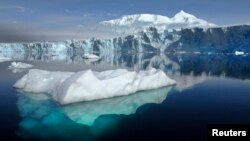 The Sheldon Glacier with Mount Barre in the background, is seen from Ryder Bay near Rothera Research Station, Adelaide Island, Antarctica, in this NASA/British Antarctic Survey photo, July 15, 2013.