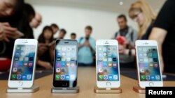 The iPhone SE is seen on display during an event at the Apple headquarters in Cupertino, California March 21, 2016. 